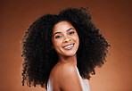 Black woman, hair care and skincare with beauty, smile and content with cosmetics, wellness and healthy teeth. Happy model, makeup and clean dental, mouth and afro hairstyle, happiness and portrait