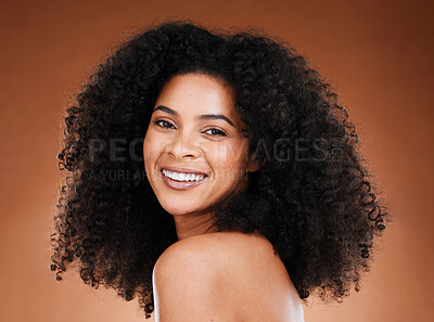 Buy stock photo Black woman afro, beauty and smile for skincare, makeup or cosmetics against a studio background. Portrait of African American female smiling with teeth in satisfaction for cosmetic facial treatment