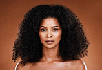 Beauty, hair care and portrait of black woman with skincare treatment, luxury facial cosmetics or clean glowing skin. Self care routine, makeup and face of model with afro hair volume after spa salon