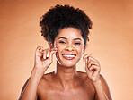 Floss, portrait and teeth of black woman in studio with product for dentist, dental and mouth cleaning healthcare promotion on marketing space. Wellness, tooth and model for dental floss advertising