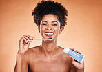 Black woman, dental hygiene and toothbrush with toothpaste for brushing teeth and smile. Oral health, African American female and lady clean mouth, fresh breath and healthy on brown studio background