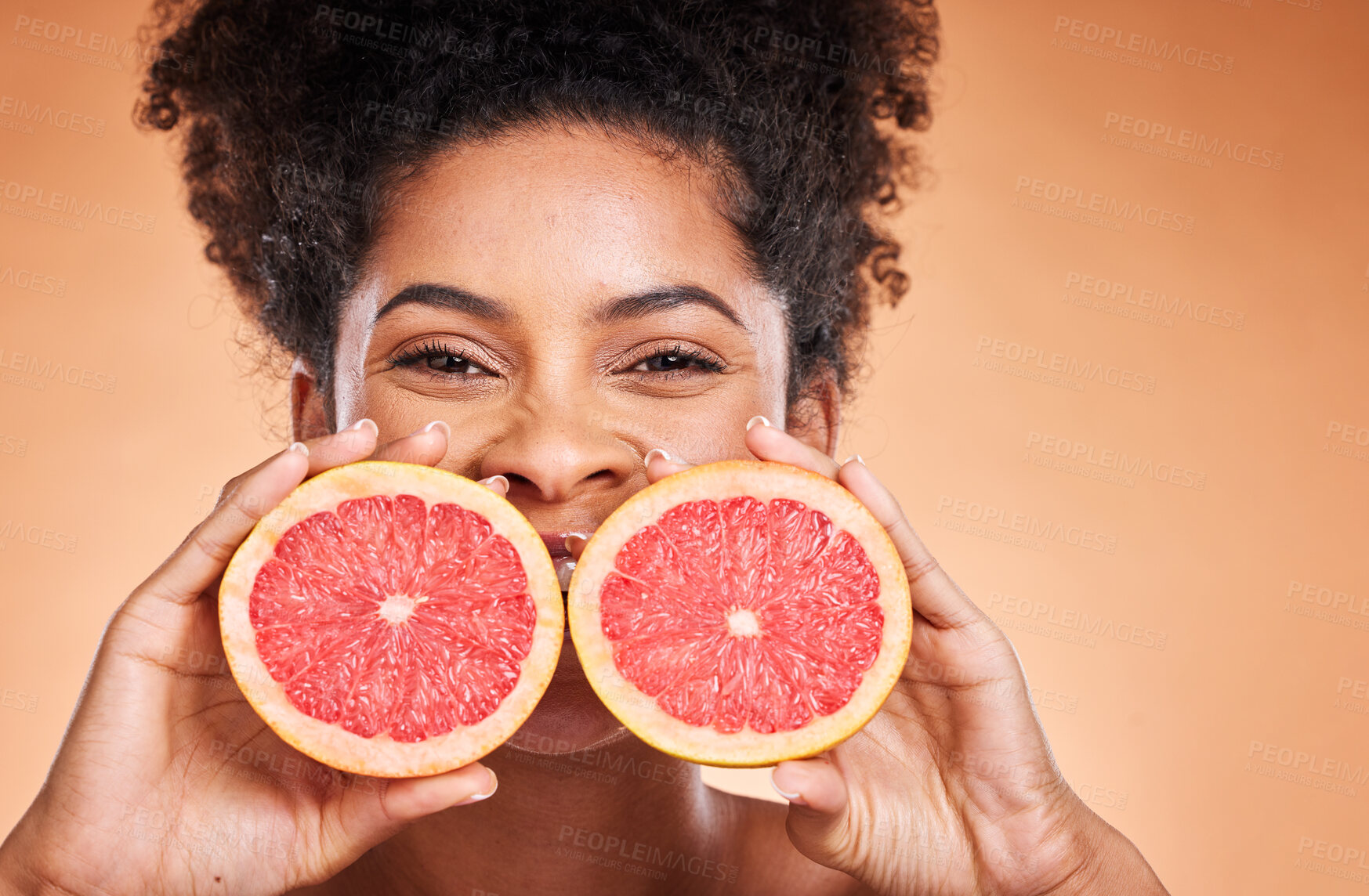 Buy stock photo Grapefruit, black woman and vitamin c beauty, skincare and wellness, healthy body and aesthetics, natural cosmetics and face on studio background. Portrait of african model, citrus nutrition and diet