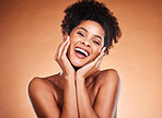 Skincare, beauty and portrait of black woman with smile in studio on orange background for body care. Wellness, happiness and young female advertising for spa, makeup and cosmetic beauty products