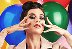 Face, beauty and makeup with a model woman in studio against a balloon background for fashion or style. Portrait, party and sad with an attractive young female posing with balloons at a birthday