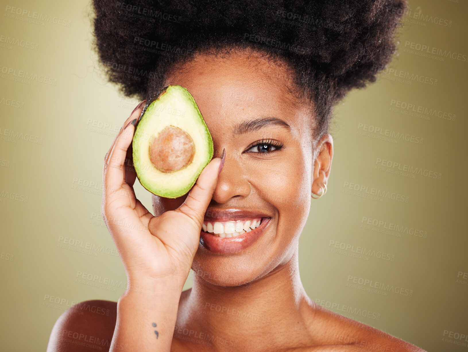 Buy stock photo Beauty, skincare and black woman with avocado cosmetics for organic skin wellness, spa detox treatment and healthy natural vegetable diet. Portrait of happy model, glowing skin and studio background 