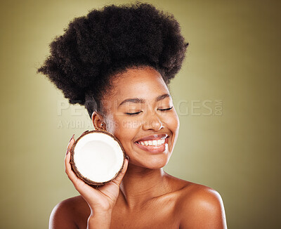 Buy stock photo Beauty, skincare and smile with black woman and coconut for moistuize, rejuvenation or tropical. Antioxidants, natural and vitamins with luxury girl model for nutrition, diet or organic treatment