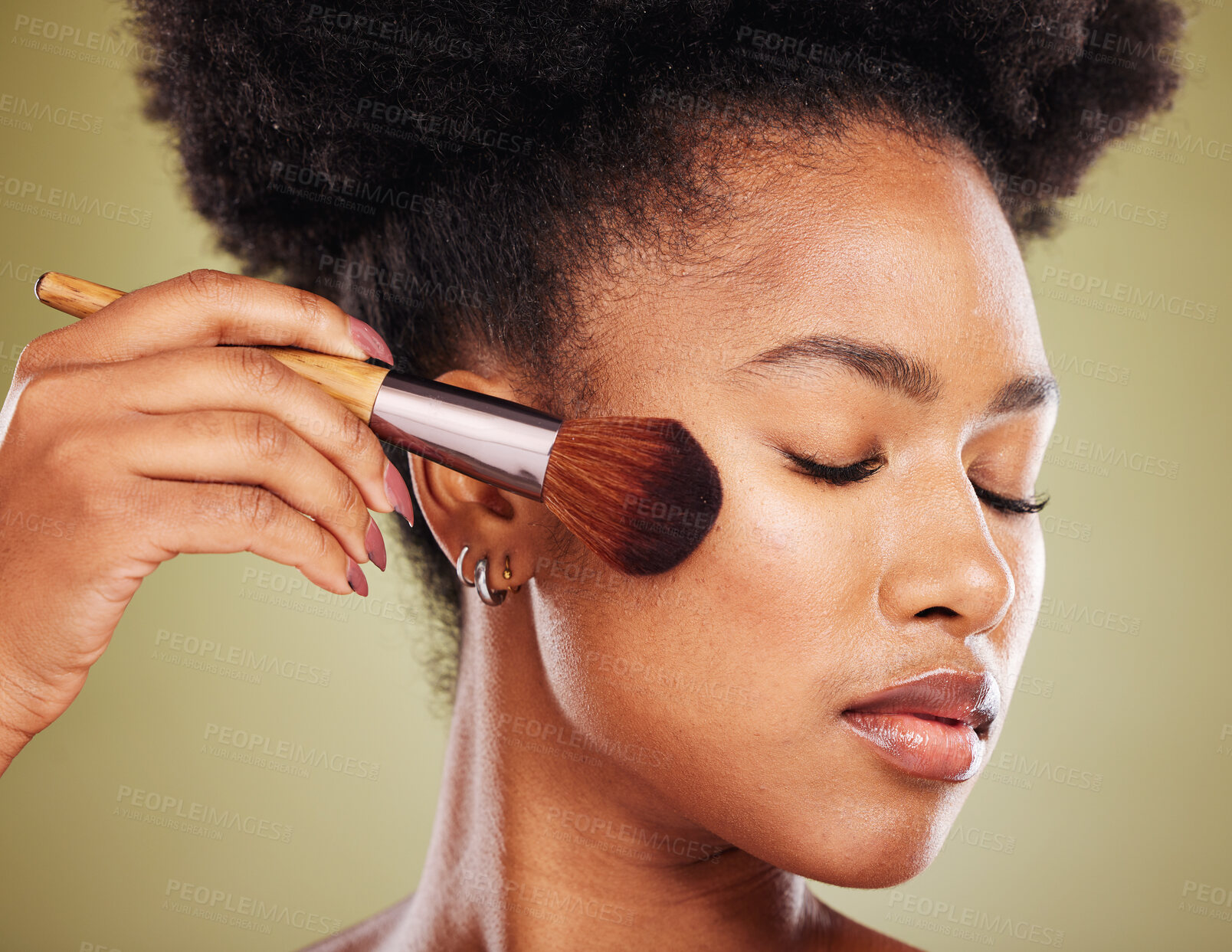 Buy stock photo Beauty, black woman with makeup and cosmetic brush and product, face closeup against studio background. Cosmetics tool, foundation and facial, manicure and microblading for wellness and skincare.