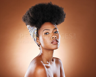 Buy stock photo Black woman afro, hair and fashion in beauty skincare, cosmetics or makeup against a studio background. Portrait of proud and confident African American female model with curly hairstyle treatment