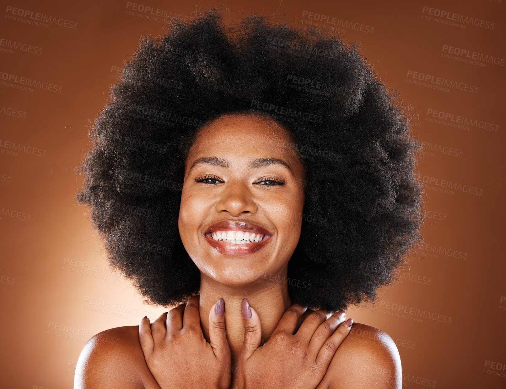 Buy stock photo Hug, makeup and black woman with self love, happy and smile for beauty against a brown studio background. Skincare, cosmetology and face portrait of an African model with a body hug for care