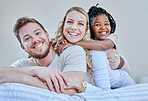 Family, parents and child in interracial portrait on bed with smile, love or happy bonding together in home. Bedroom, multicultural diversity and black girl with foster mom, dad or happy family relax