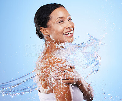Buy stock photo Black woman, water splash and skincare beauty cleaning mockup for luxury body wellness, healthy and clean skin glow. Healthcare model portrait, spa treatment and organic cosmetics on blue backgroundb