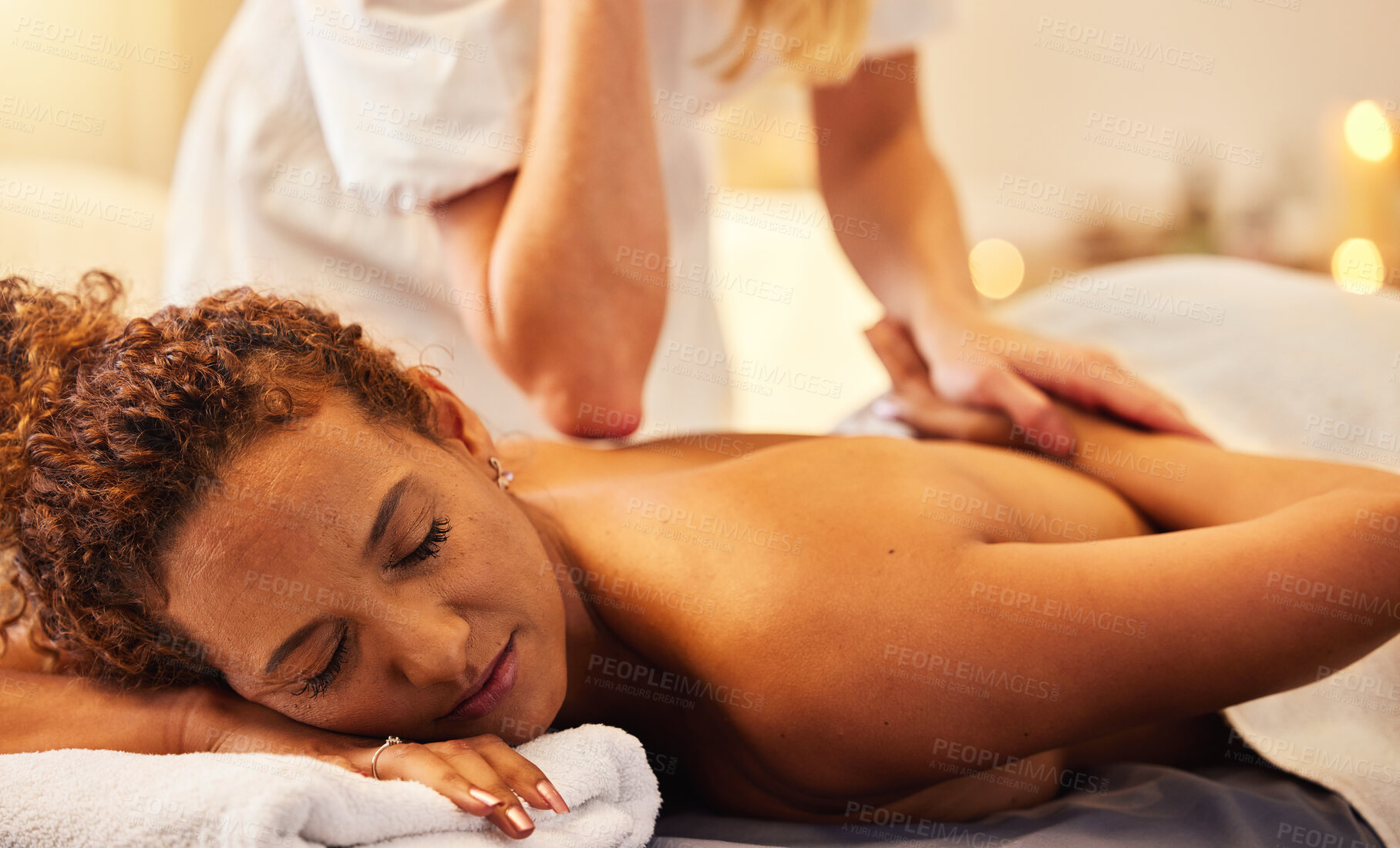 Buy stock photo Relax woman, beauty and hands at a spa for a massage for back pain and body physical therapy. Relaxing, massage therapist and peaceful person resting and enjoy healthy luxury healing body treatment 