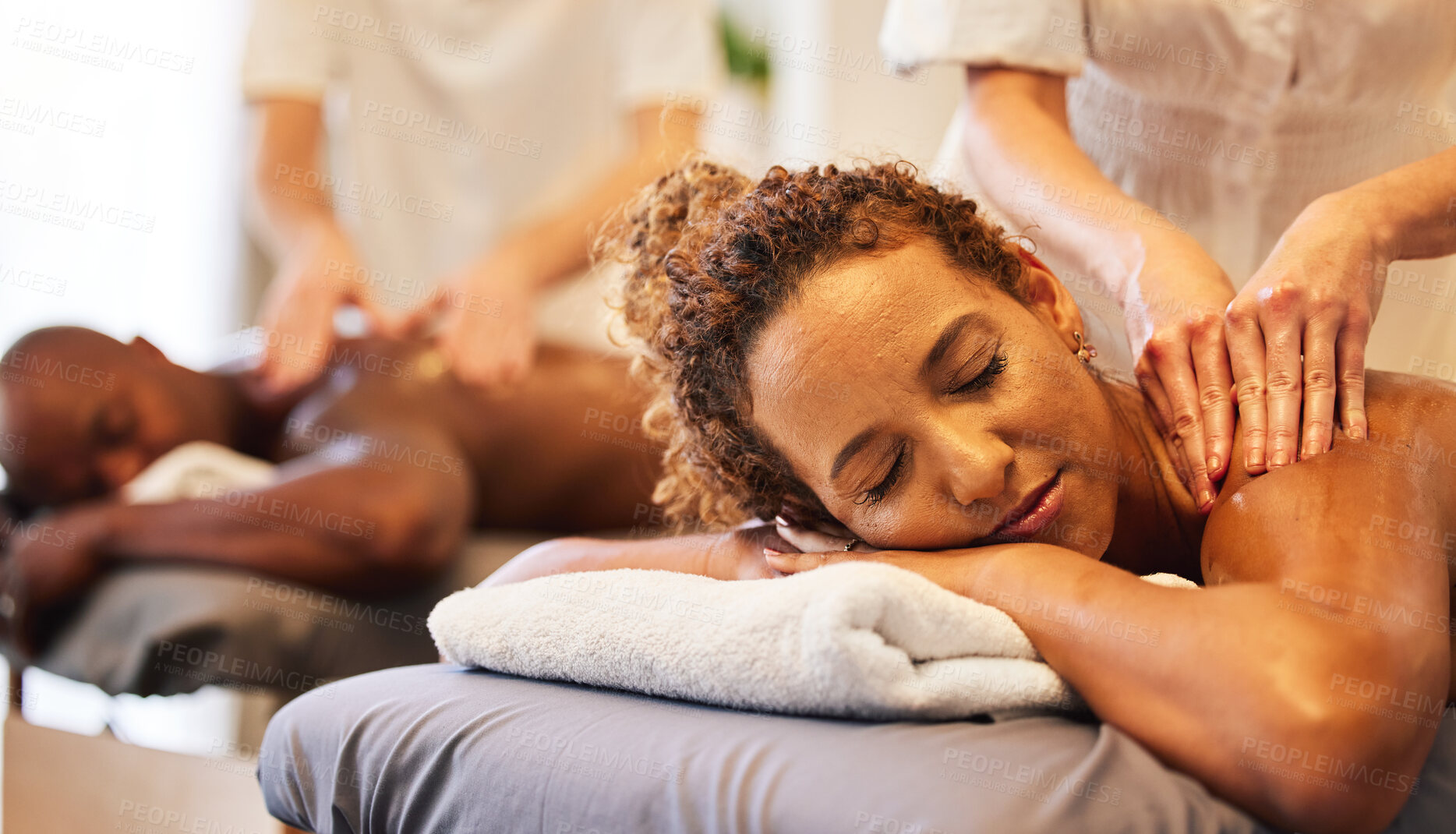 Buy stock photo Black couple massage, spa and relax together on vacation, holiday or retreat for bonding, honeymoon or calm. Black woman, man or couple together for masssage therapy service, health and wellness