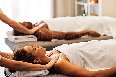 Buy stock photo Spa, relax and couple massage for luxury wellness therapy or skincare health with masseuse hands. Zen physcial therapy, African man and woman body detox and peace at beauty salon for calm bodycare