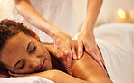 Spa, massage and wellness of a senior woman at a luxury resort or health therapy for zen treatment. Massage therapist hands for body care, relax and skin session of a elderly customer feeling calm