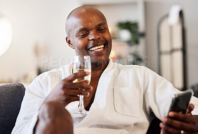 Buy stock photo Black man, phone and champagne to relax, celebrate and hospitality at hotel spa while online with 5g network for communication and social media. Happy male drinking wine for online review post