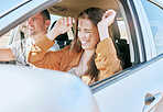 Couple, road trip and smile in car together in traffic for drive, transport or driving adventure. Man, woman and happy on road, street or journey with happiness on travel, holiday or vacation in sun