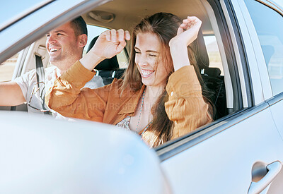 Buy stock photo Couple, road trip and smile in car together in traffic for drive, transport or driving adventure. Man, woman and happy on road, street or journey with happiness on travel, holiday or vacation in sun