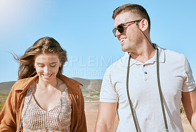 Buy stock photo Couple, happy and walking on a desert safari adventure on vacation travel with a smile. Friends of romantic partners on holiday with freedom and summer love in Africa with happiness and free feeling
