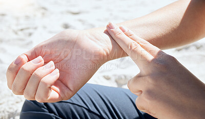 Buy stock photo Woman, hand and check pulse, heartbeat and wrist with finger outdoor after workout, training or cardio. Person, hands and monitor heart rate after healthy workout or body activity in nature at beach