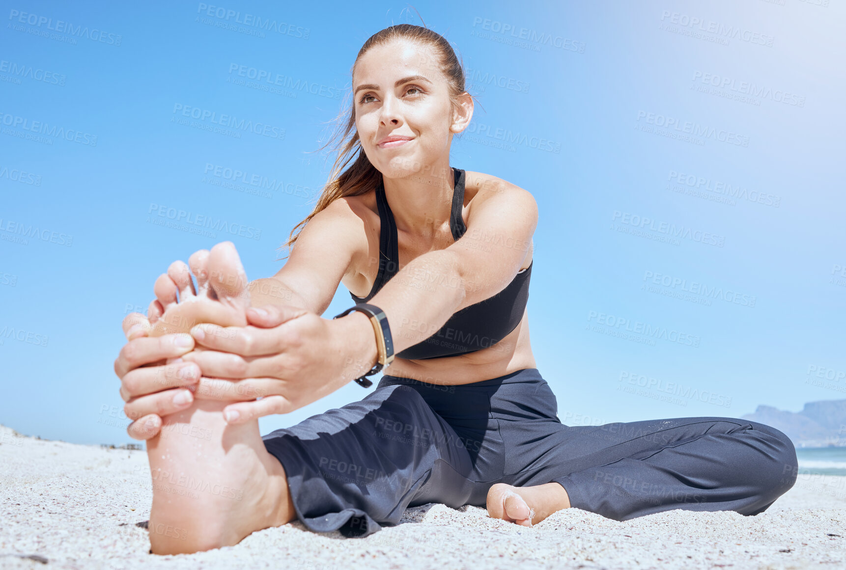 Buy stock photo Woman, beach yoga and stretching feet, legs and body for exercise, training and summer workout. Fitness girl, sea sand and pilates wellness, healthy lifestyle and energy in nature, ocean and sunshine