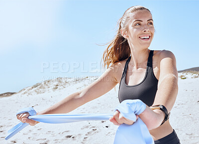Buy stock photo Fitness, beach and band stretch with a woman using a resistance band for arm stretching by the ocean. Rubber, warmup and health, fit and strong female for body wellness and training by the sea