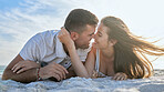 Love, affection and couple at the beach for a date, vacation or relax on the sand in summer. Freedom, travel and man and woman with affection, care and peace on a holiday by the sea together
