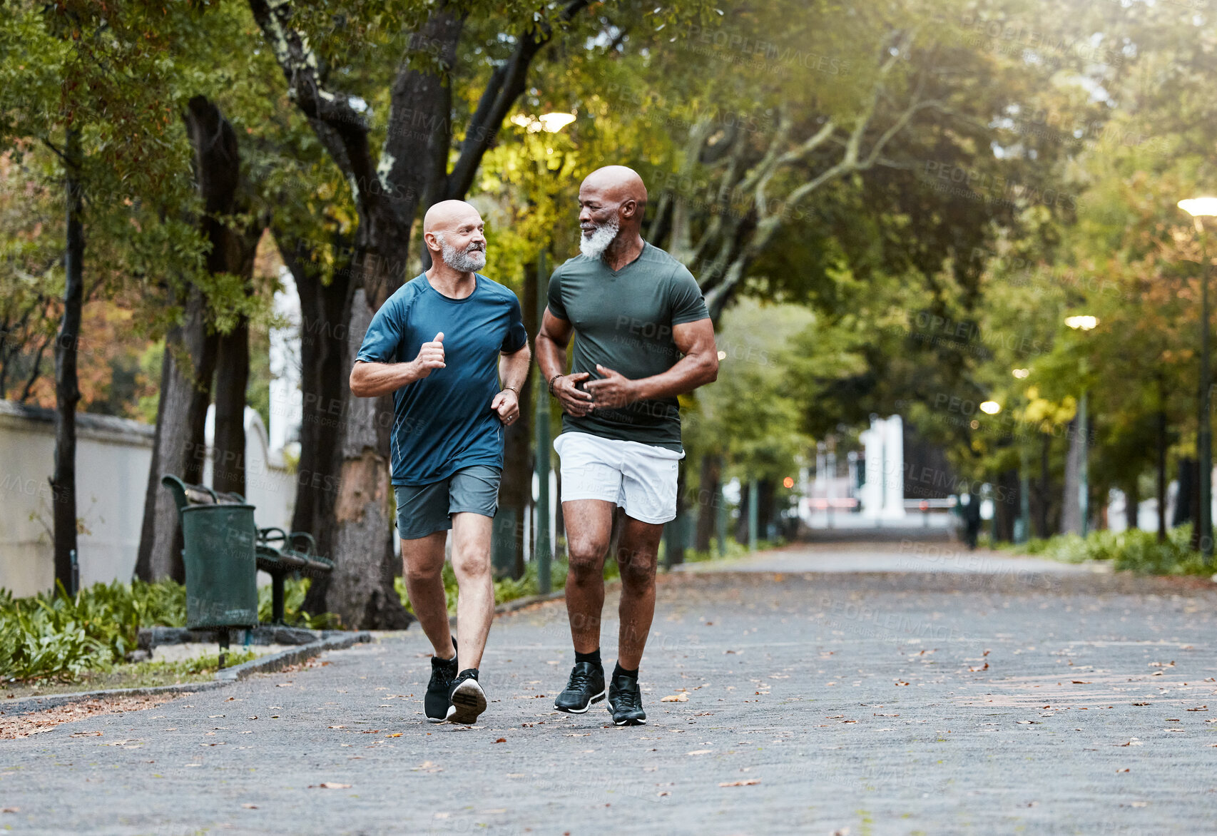 Buy stock photo Mature, men and fitness with friends running in park for exercise, workout and wellness. Exercising, working out and diverse male athletic friend in cardio training for body health and stamina 