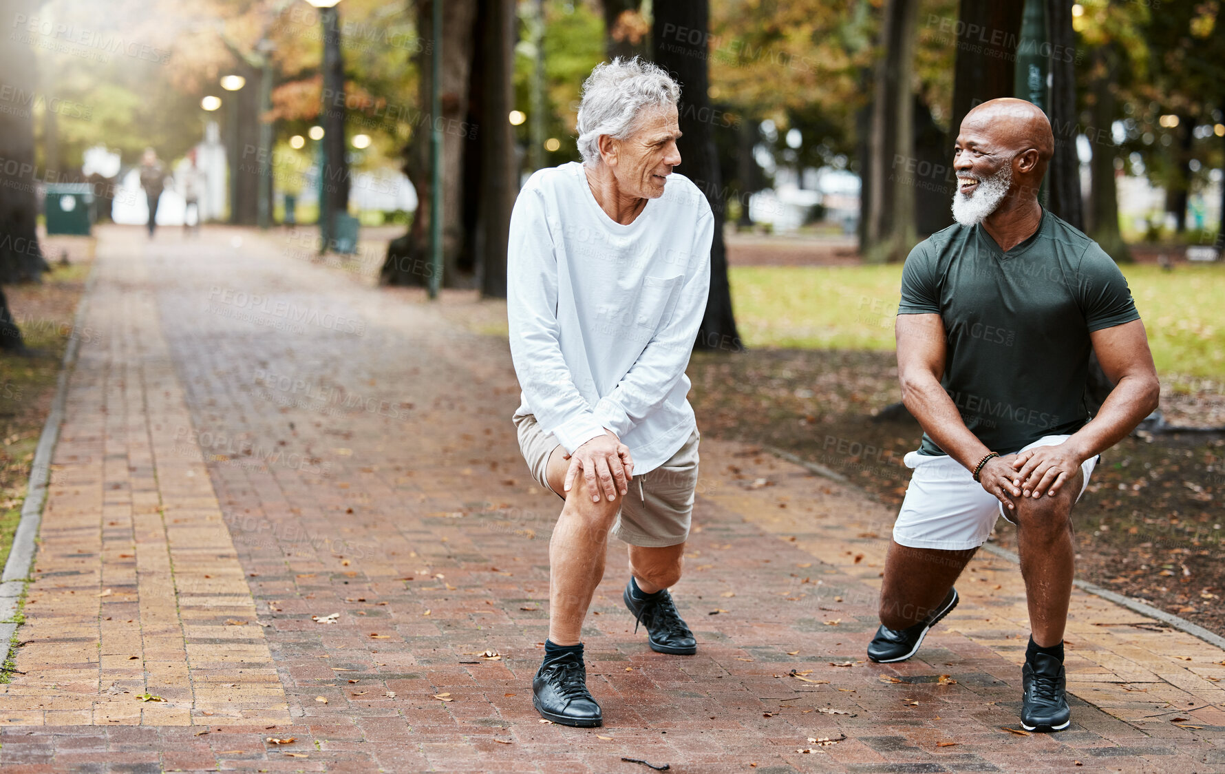 Buy stock photo Fitness, friends and exercise with senior men stretching for a warm up at an outdoor park for health and wellness during retirement. Old man and cardio partner together for a workout while talking