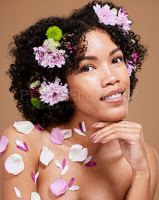 Buy stock photo Beauty, art and black woman with flowers in hair in portrait with studio background. Nature, luxury spa and woman with flower crown, natural skincare or hair care product with sustainable ingredients