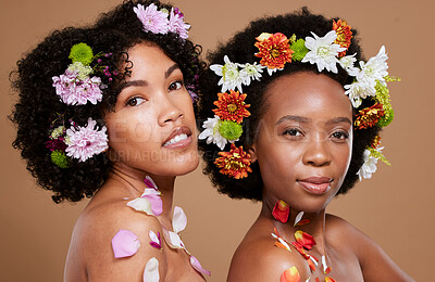 Buy stock photo Beauty, flowers and skincare with black women friends together for natural cosmetics, makeup and self care mockup on studio background. Portrait of models for spring or floral aesthetic dermatology