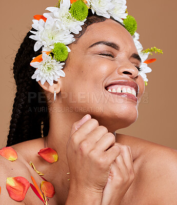 Buy stock photo Beauty, skincare and flowers in hair of black woman for self love, natural and spring season. Luxury, happy and fresh with girl model and petals for style, fashion and creative in studio background 