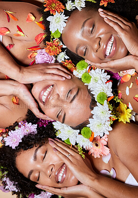 Buy stock photo Black woman, flowers and face skincare beauty for cosmetics makeup or natural skin wellness. African friends, floral crown and nature product for luxury plant aesthetic or relax, zen and facial care