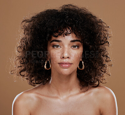 Buy stock photo Portrait, skincare and black woman in studio for hair, skin and beauty, grooming and hygiene on brown background. Face, wellness and girl model with natural, afro and glam cosmetic with makeup