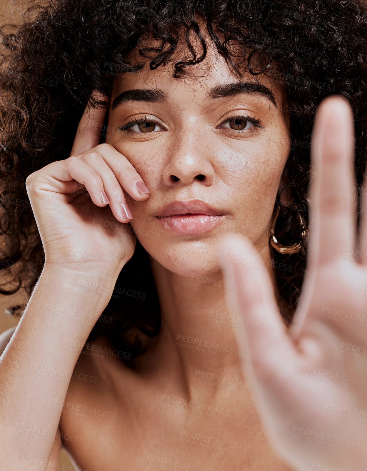 Buy stock photo Skincare, hand and portrait of woman in studio for beauty, makeup and glamour skin cosmetic treatment. Portrait, face and black woman serious about hair care, natural hair and luxury afro grooming 