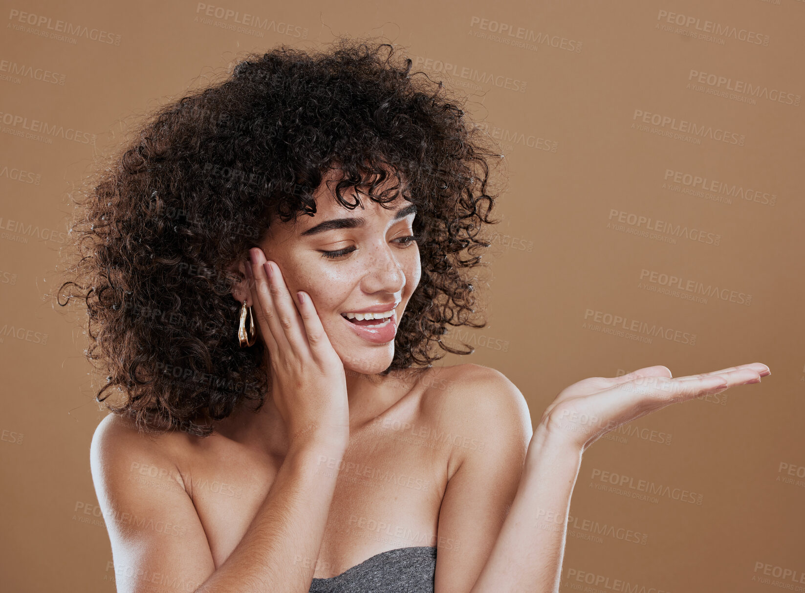 Buy stock photo Woman, hand and beauty with advertising space for skincare, wellness and makeup marketing mockup in brown studio background. Model, happy and smile with hands gesture, cosmetics and health skin  