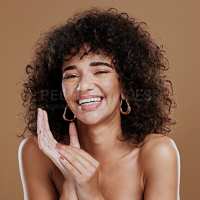 Buy stock photo Comic, makeup and face of a woman with an afro hair care, skincare and glow from cosmetics against a brown studio background. Beauty, happy and portrait of a model with wellness and happiness