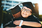 Hug, graduation and student achievement, happy or smile for success outdoor in gown. Graduate, academic or embrace for diploma, happiness or certificate completed at university, college and education