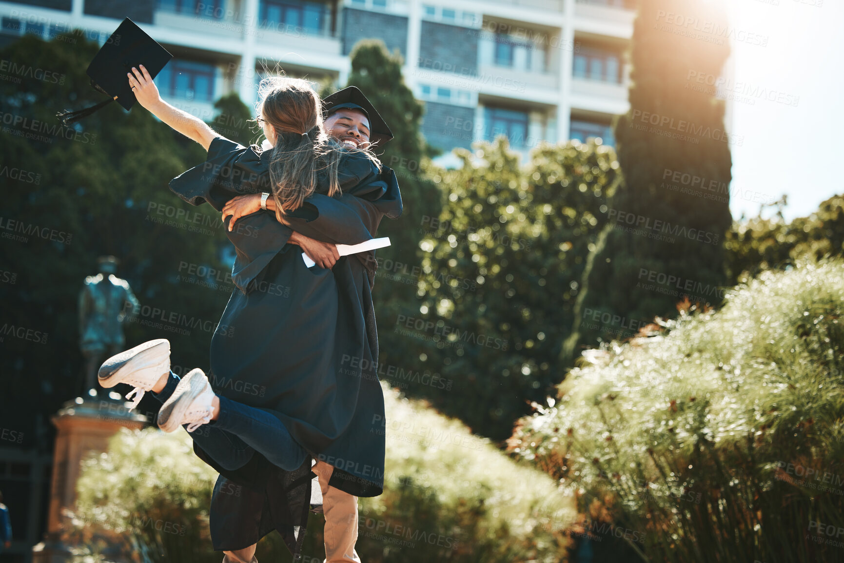 Buy stock photo University, education and students hug at graduation with degree, diploma or certificate. Support, success and happy friends hugging, graduate or celebrate academic achievement or complete college.