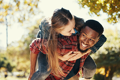 Buy stock photo Piggy back, couple and love in park, smile and happy on date, romance and fun together in spring nature. Interracial man and woman happiness, play or relationship outdoor in forest, care or woods