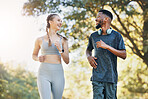 Couple, training and face outdoor, running for health, wellness and workout together. Man, woman and fitness in nature, for exercise and smile to relax, practice and workout for bonding and loving. 