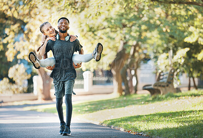 Buy stock photo Interracial couple, piggy back and outdoor with smile for fitness, health and exercise in park. Runner, black man and woman on back in workout, running or wellness in urban sunshine by trees together