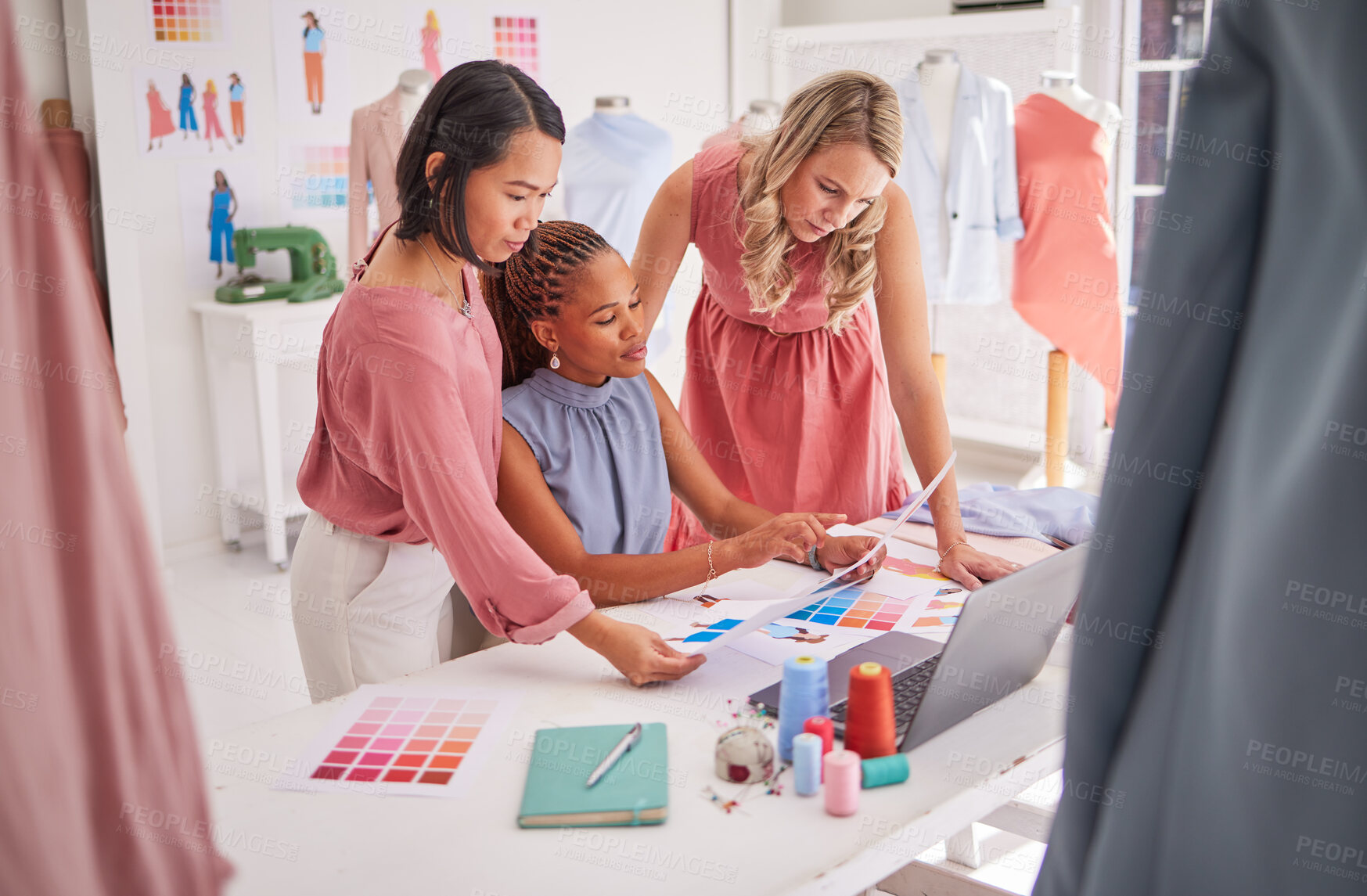 Buy stock photo Creative startup, fashion and design team together for planning, ideas and inspiration talking at desk about designer clothes project. Business women in discussion about color and fabric in workshop