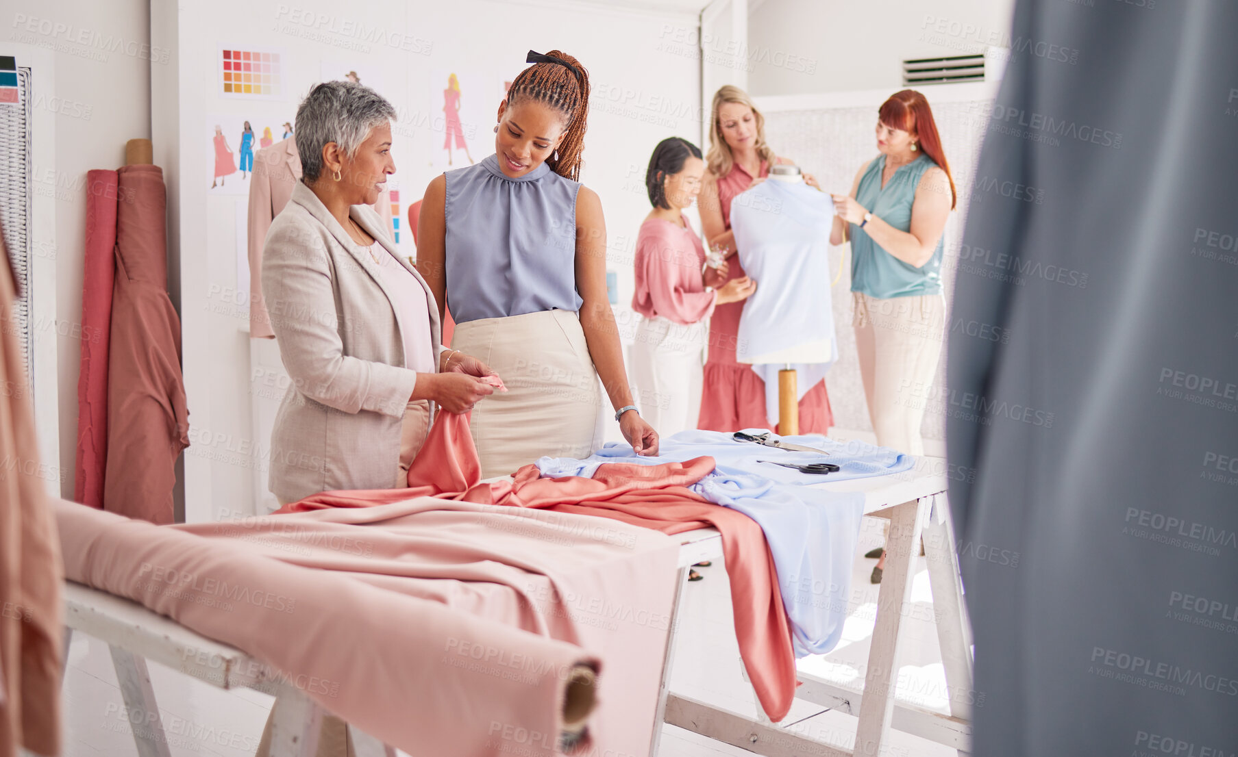 Buy stock photo Fashion, team and design planning, teamwork and support with material, creative and collaboration in a workshop. Cloth, fabric and texture in designer small business with group working in a studio