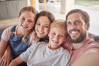 Buy stock photo Family, children and parents taking a selfie in their home on the sofa in a lounge with love, care and a smile. Portrait and faces of a father, mother and happy kids bonding and making a memory