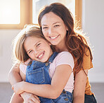 Mother, love and hug girl for support, trust and relax quality time in family home. Happy mom, excited kid and portrait smile together for happiness, gratitude connection and relationship bonding 