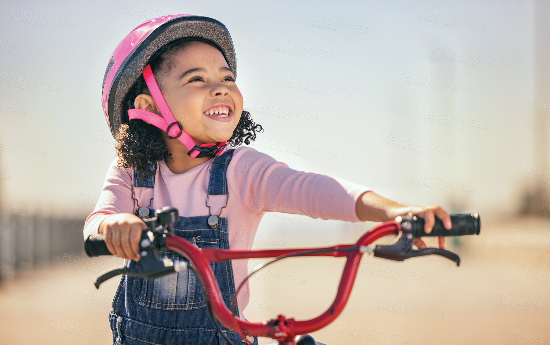 Buy stock photo Thinking, eco friendly and girl cycling on a bike, learning and training in city with a smile. Playing, exercise and child on a bicycle for carbon footprint, sustainability and happy in the street