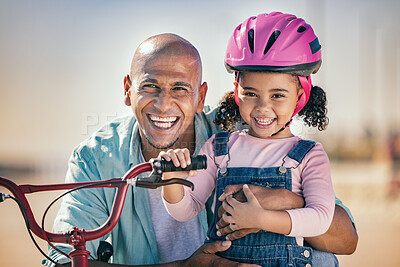 Buy stock photo Summer, father and portrait of family with bike in sunshine for bond, wellness and happiness. Black family, care and smile of happy dad teaching young and cute daughter bicycle riding lesson.

