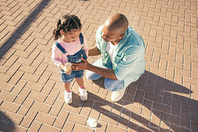 Buy stock photo Summer, crying and girl with ice cream on floor standing with dad outdoors upset, sad and unhappy. Childhood, family and father consoling and comforting young child after sweet dessert fell on ground