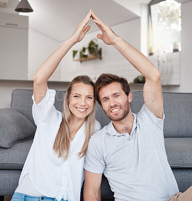 Buy stock photo Real estate, security and couple with roof hands for safety, investment and insurance in their house. Property, happy and portrait of a man and woman with smile for future in their new home together